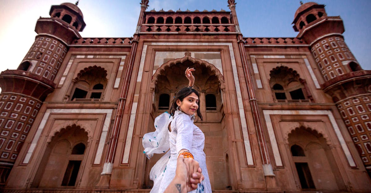 How many shots do temple have in Sky Temple? - Woman Wearing White Dress Standing Near Building How many shots do temple have in Sky Temple? - Woman Wearing White Dress Standing Near Building