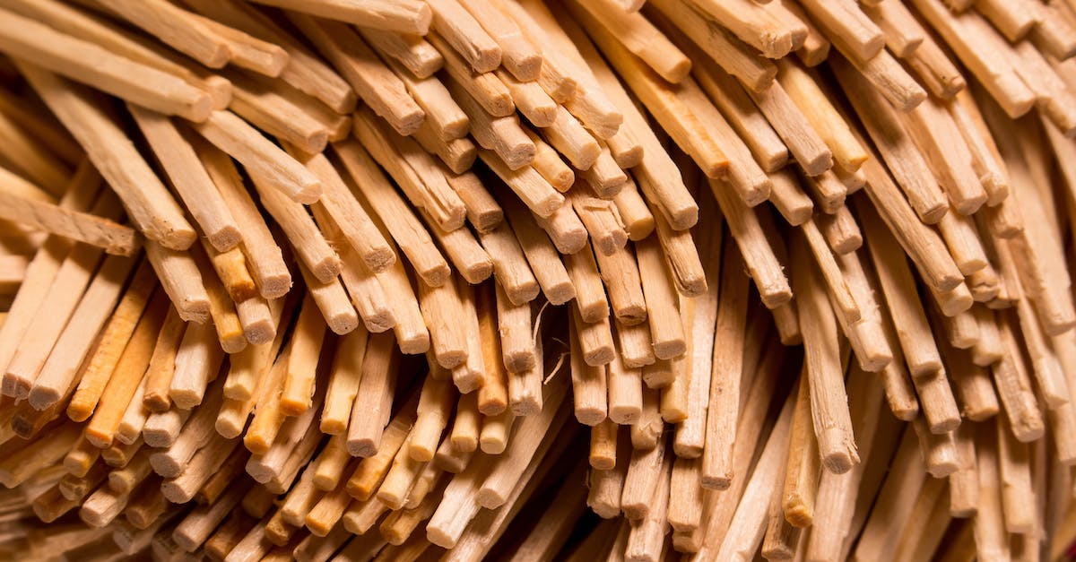 How many strange planks are there to collect? - Closeup texture of stacked wooden thin sticks with uneven surface placed as abstract background How many strange planks are there to collect? - Closeup texture of stacked wooden thin sticks with uneven surface placed as abstract background