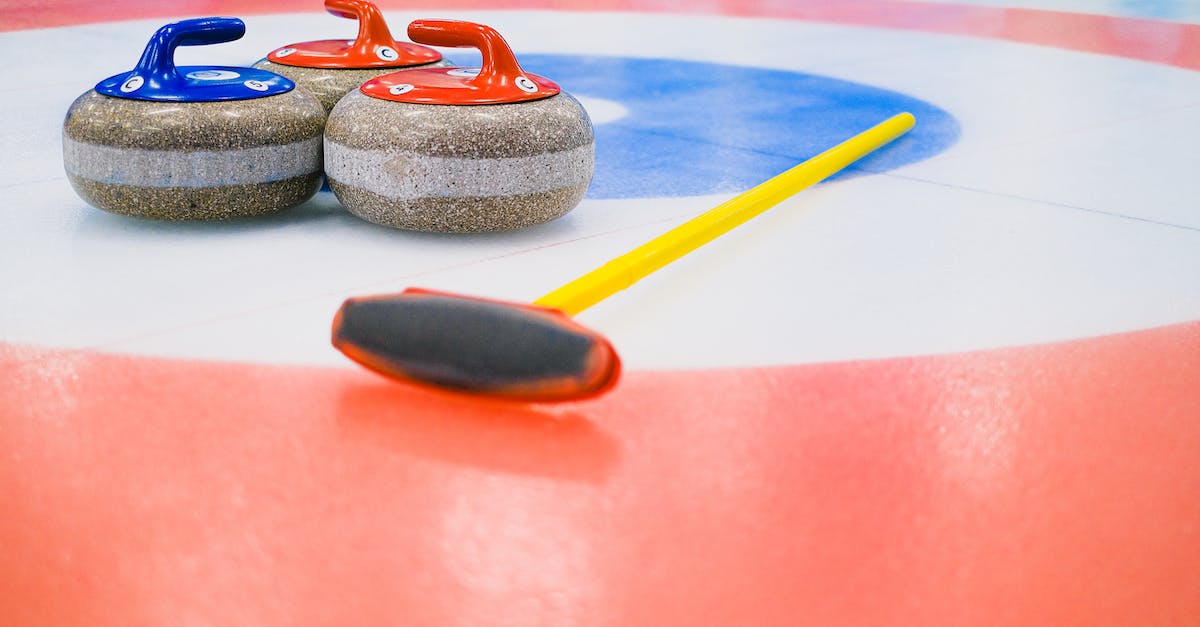 How many ticks for stone to form - Heavy granite curling stones with handles and broom placed on ice in colorful circular target area during game in arena How many ticks for stone to form - Heavy granite curling stones with handles and broom placed on ice in colorful circular target area during game in arena