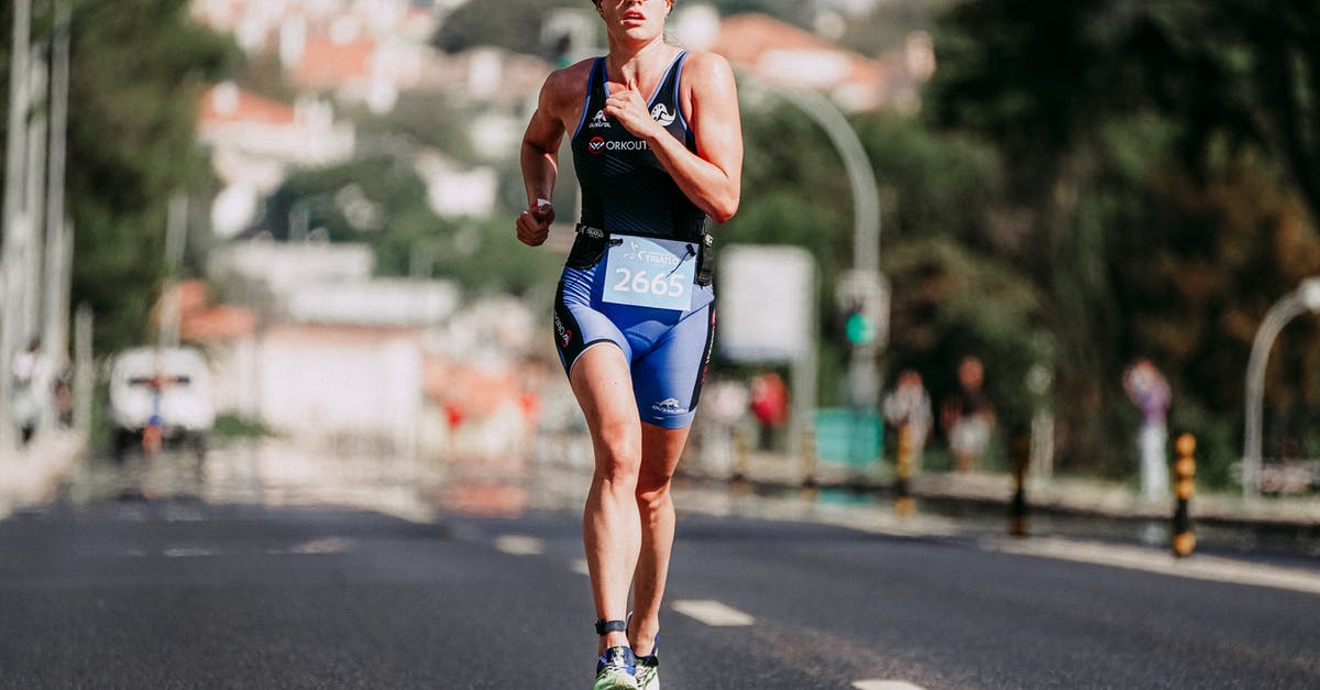 How much bonus damage and sign intensity does the Focus talent provide? - Full body of faceless young sporty person in tracksuit and glossy sunglasses running on even asphalt road in daytime on blurred background