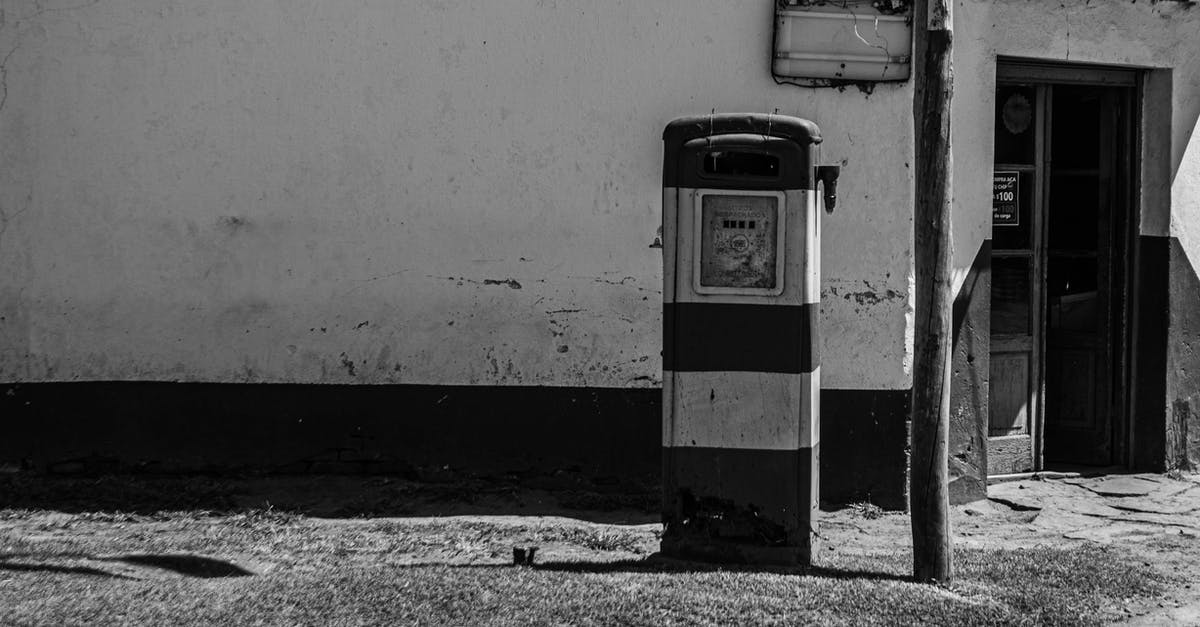 How much damage do Smoke's gas canisters deal? - Old gas station on rough walkway on street