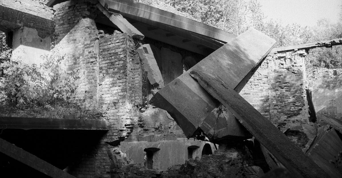 How much damage does a melee attack do? - Grayscale Photo of Concrete Building
