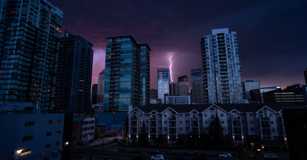 How much damage does Great Lightning Spear do? (PvE) - Dramatic Night Sky over Skyscrapers