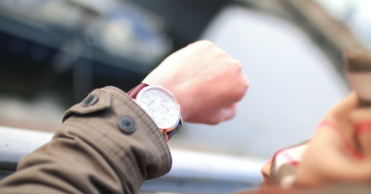 How much does each specialist reduce the waiting time on resources? - Selective Focus Photography of Person Watching Watch