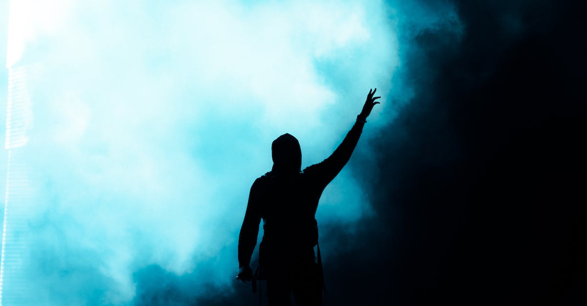 How Powerful is Mind Control? - Fight between evil and good and victory over flaws shown by anonymous figure raising hand with hope from darkness How Powerful is Mind Control? - Fight between evil and good and victory over flaws shown by anonymous figure raising hand with hope from darkness