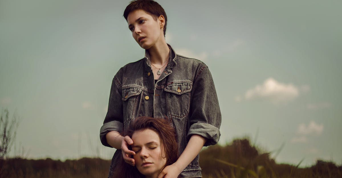 How short or long can my trainer name be? - Woman with Short Hair Touching Head of Her Sitting Sister