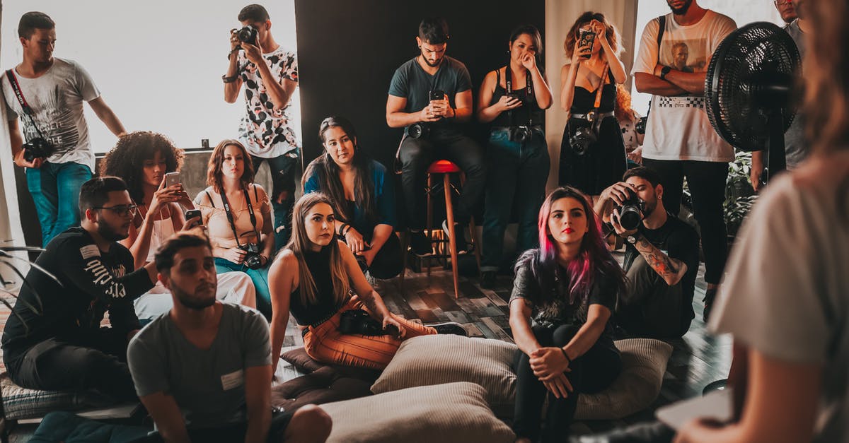 How should I assemble a squad in Draft Mode? - Group of multiethnic young people wearing casual clothes gathering together in spacious studio and listening attentively to female speaker How should I assemble a squad in Draft Mode? - Group of multiethnic young people wearing casual clothes gathering together in spacious studio and listening attentively to female speaker