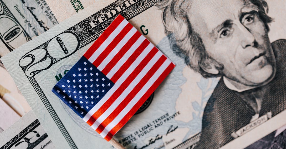 How should I take duration into account for trade routes? - From above of small American flag placed on stack of 20 dollar bills as national currency for business financial operations