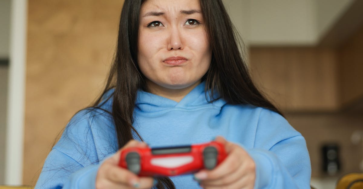How to avoid becoming stressed while playing endurance games? [closed] - Woman in Blue Long Sleeve Shirt Holding Red and Black Hand Tool