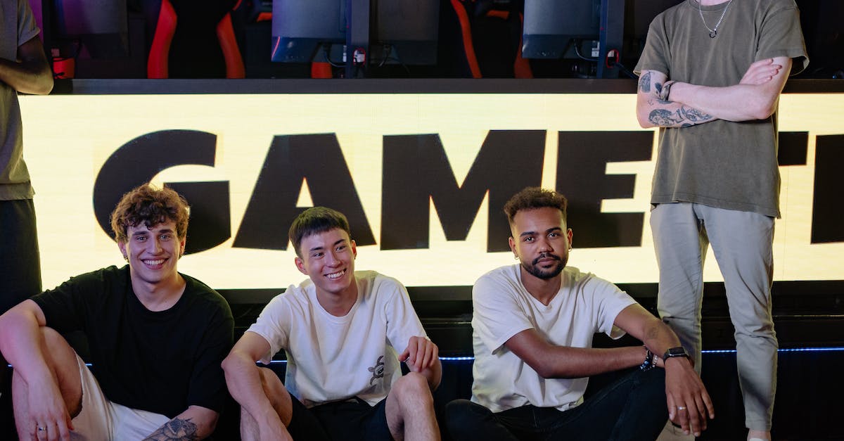 How to backstab on PC? - 3 Men Sitting on Yellow and Black Chair