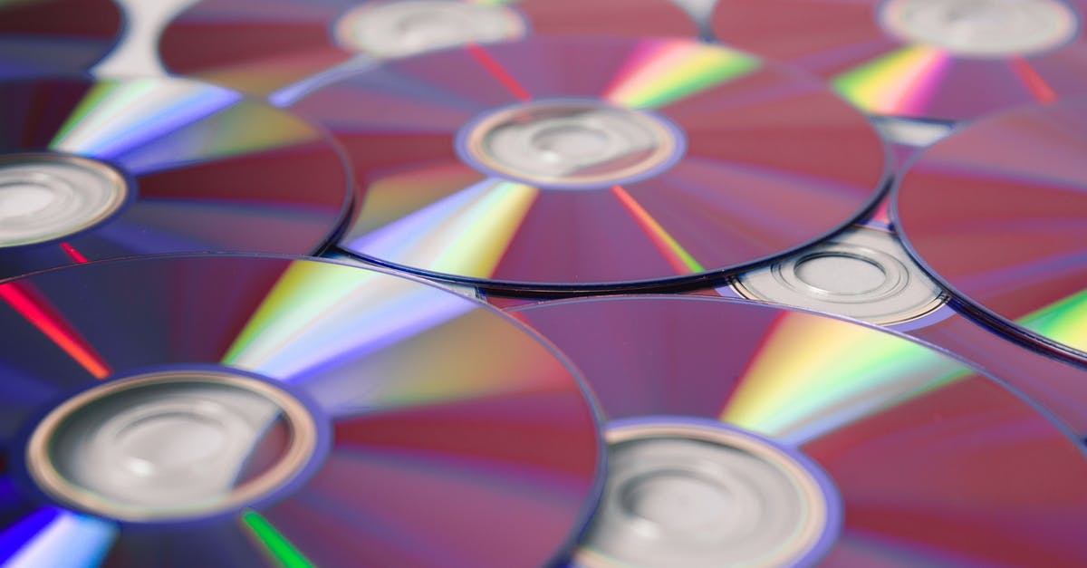 How to backup Minion Rush? - Compact Discs In Close-up View How to backup Minion Rush? - Compact Discs In Close-up View