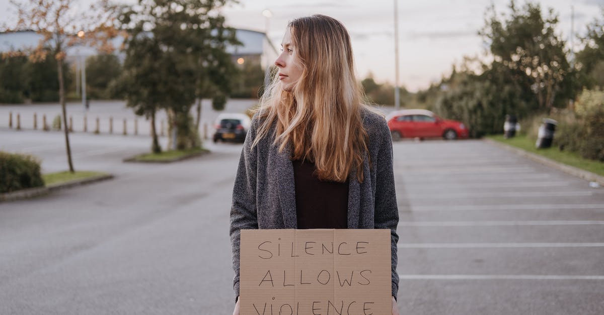 How to best utilize Zz'Rot Portal and banner of command as a support - Woman with slogan silence allows violence