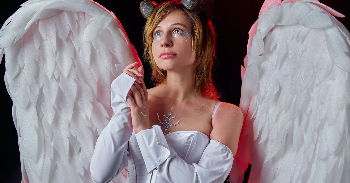 how to breed te fallen angel dragon - Dreamy woman in carnival costume with feathers on wings how to breed te fallen angel dragon - Dreamy woman in carnival costume with feathers on wings