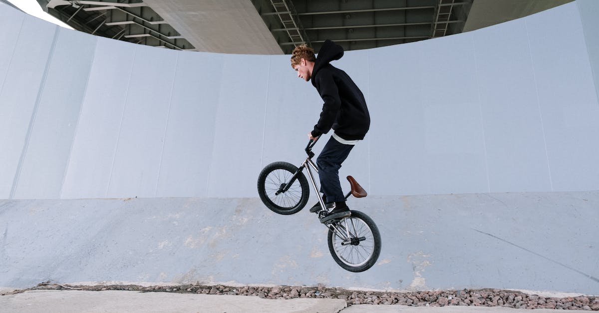 How to cancel a reloading action properly? - Man Jumping While Riding a Bicycle 