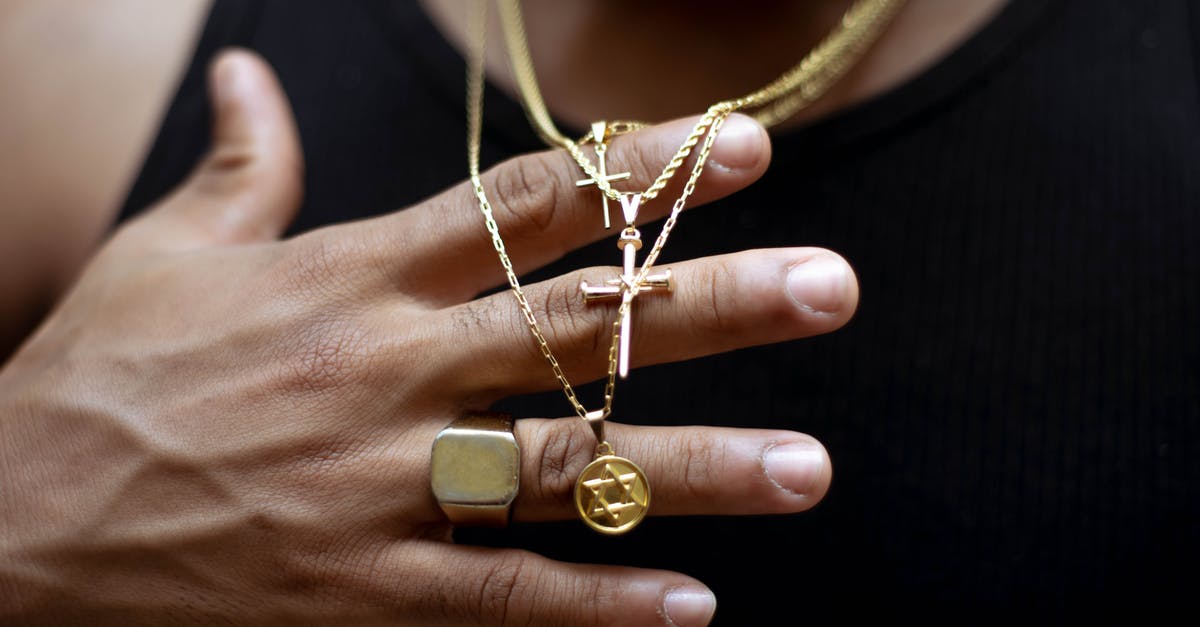 How to cancel Xbox Gold subscription without sign in details? - Unrecognizable crop ethnic male in golden chains with crosses and six pointed star of David How to cancel Xbox Gold subscription without sign in details? - Unrecognizable crop ethnic male in golden chains with crosses and six pointed star of David