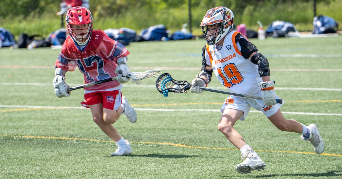 How to change a players game mode when crossing a threshold [duplicate] - Young Athletes Running on the Field while Holding a Lacrosse Stick