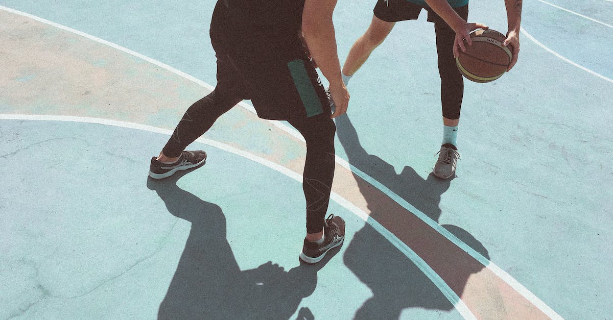 How to change a players game mode when crossing a threshold [duplicate] - Man in Black and Red Nike Basketball Jersey Playing Basketball
