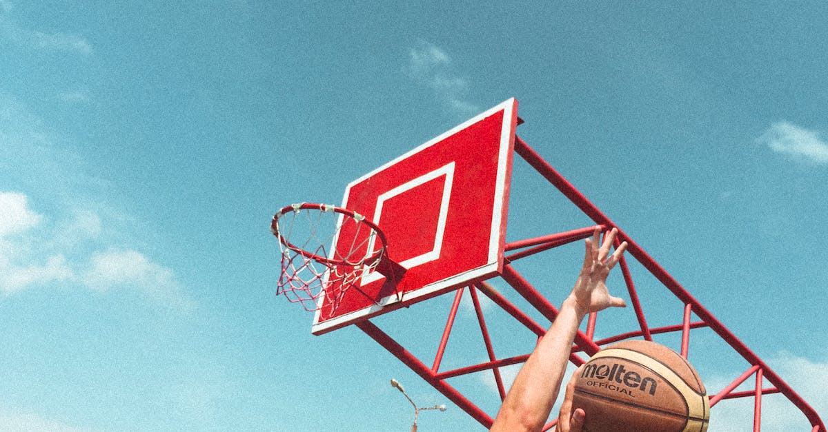 How to change a players game mode when crossing a threshold [duplicate] - Man in Black Tank Top Playing Basketball