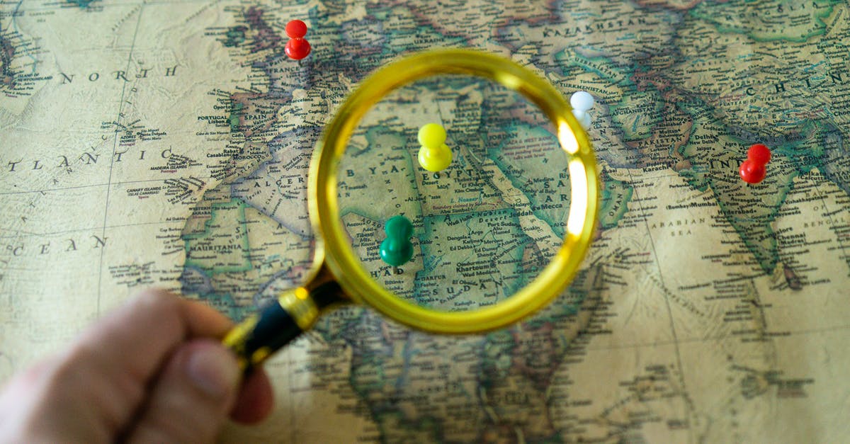 How to change a singleplayer world into a multiplayer world [duplicate] - Hand with Loop Looking at Map with Pins