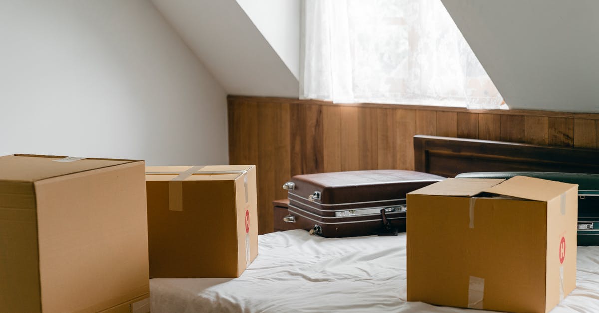 How to change the language of Minecraft: Windows 10 Edition Beta? - Small cardboard boxes and leather cases placed on bed with sheet near big box in light room of house under sloping roof How to change the language of Minecraft: Windows 10 Edition Beta? - Small cardboard boxes and leather cases placed on bed with sheet near big box in light room of house under sloping roof