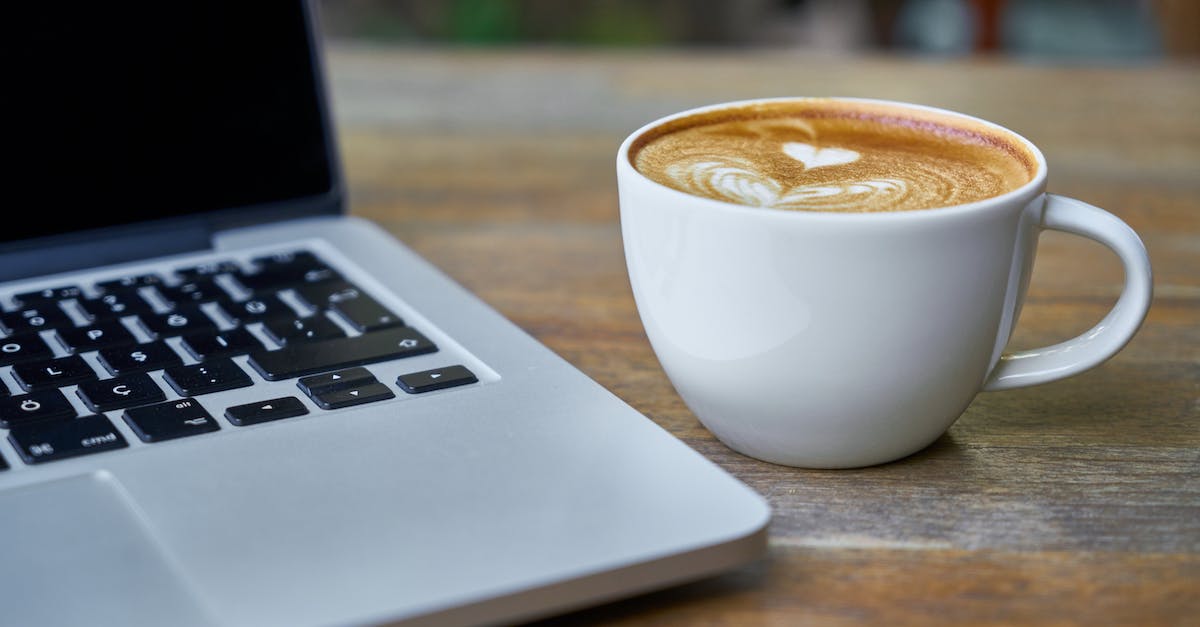 How to close computer terminal with a hot key? - Teacup of Latte Beside Macbook Pro