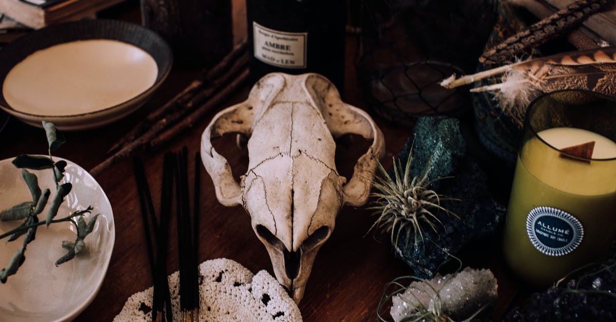 How to complete my death claw objective? - Table setting with candles and skull