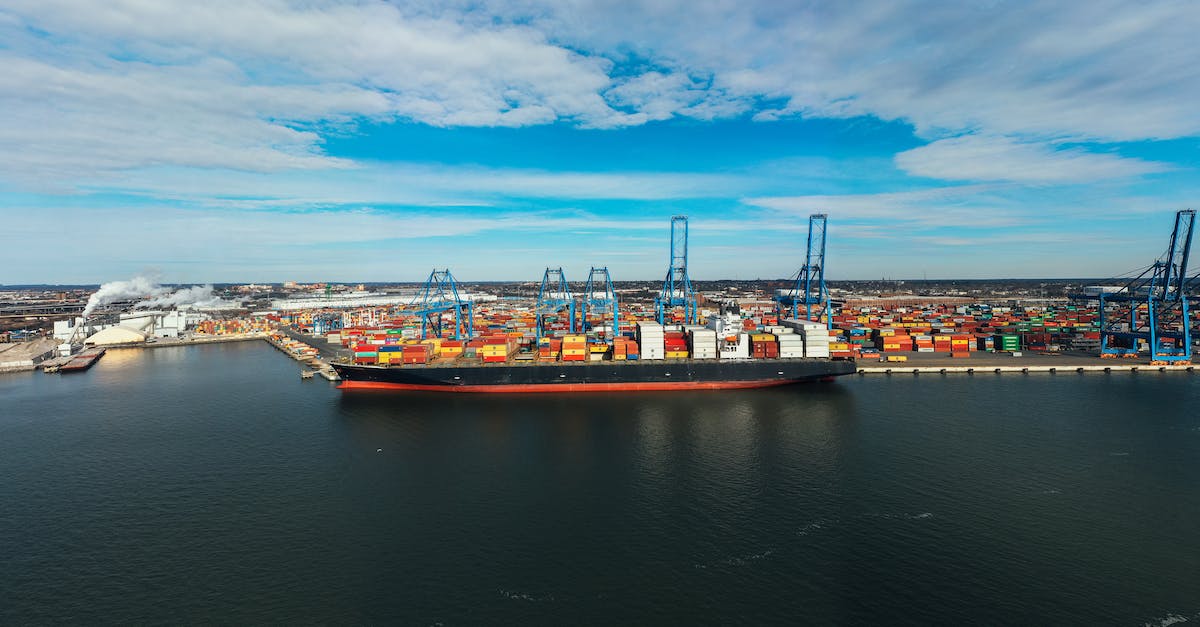 How to create a large ocean area using Bukkit? - High angle of cargo ship moored in modern industrial port under blue cloudy sky in daylight How to create a large ocean area using Bukkit? - High angle of cargo ship moored in modern industrial port under blue cloudy sky in daylight