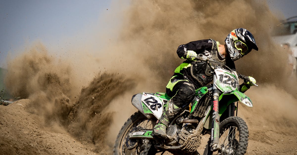 How to cross lava? - Rider Riding Green Motocross Dirt Bike How to cross lava? - Rider Riding Green Motocross Dirt Bike