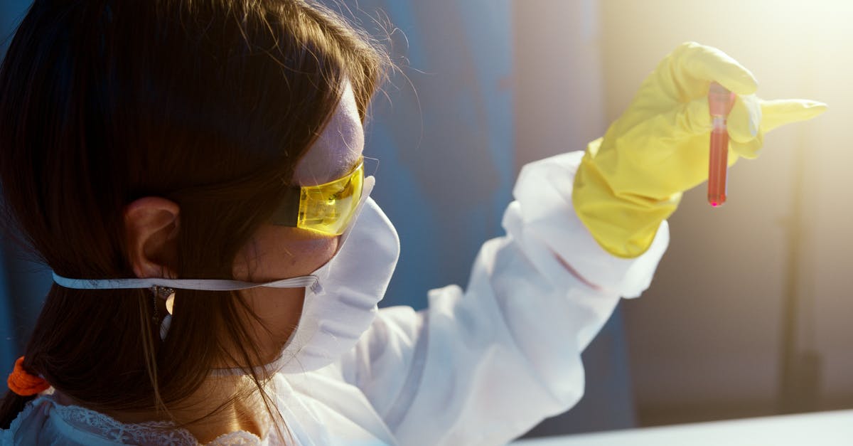 How to cure Zombie Pigmen anger infection? - A Woman Holding While Looking at a Blood Tube