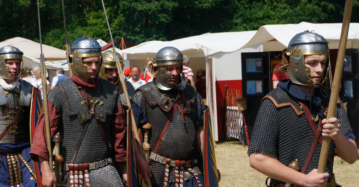 How to deal with hyper control warrior as an aggressive deck - Military historical reconstruction male group in metal helmets and weapons in sunny warm day