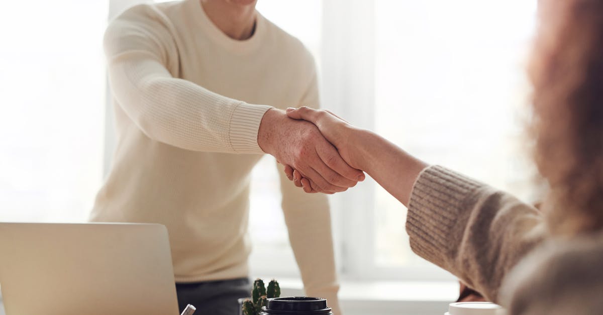 How to deal with lack of a certain resource? - Man and Woman Near Table How to deal with lack of a certain resource? - Man and Woman Near Table