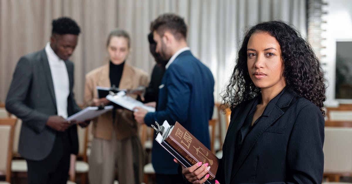 How to deal with people who keep demanding replies to Spacebook messages? - Woman in Black Blazer Holding Book