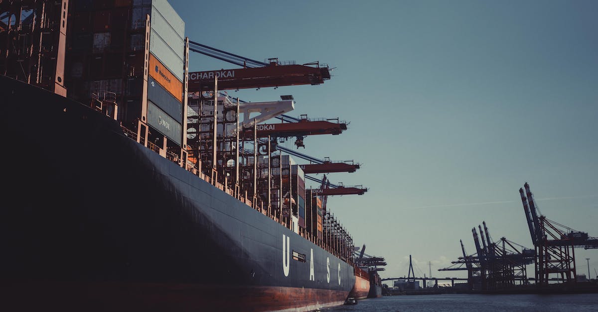 How to decide later when a ship is captured but the dock is full? - Shallow Focus Photography of Black Ship