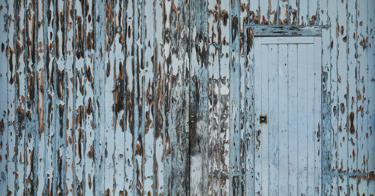 How to destroy an empty Quarry? - Entrance of aged damaged abandoned wooden warehouse with peeling white paint on wall How to destroy an empty Quarry? - Entrance of aged damaged abandoned wooden warehouse with peeling white paint on wall