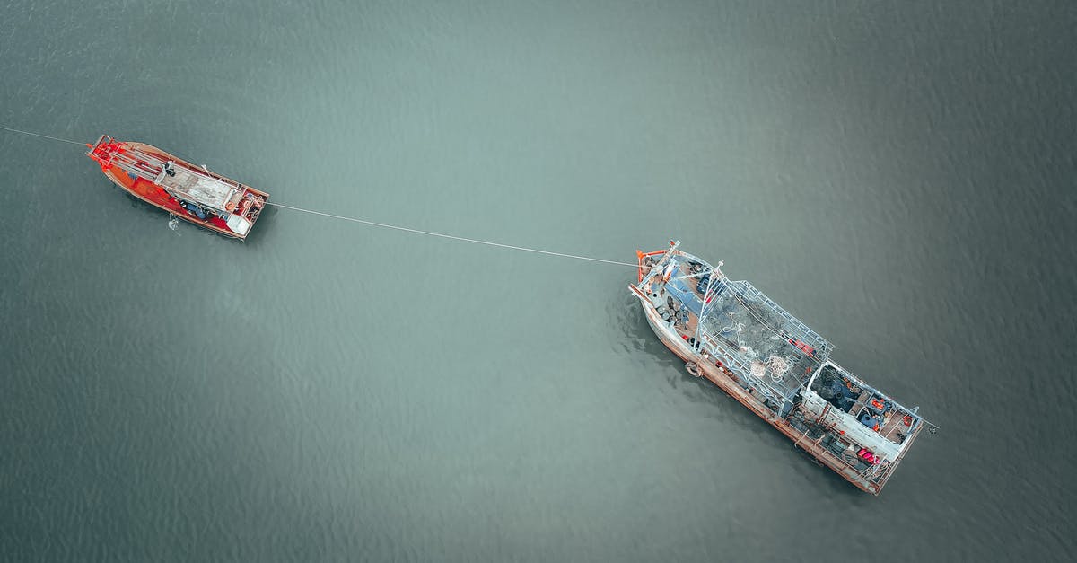 How to detach the tow cable? - Barge and boat on rippling water How to detach the tow cable? - Barge and boat on rippling water