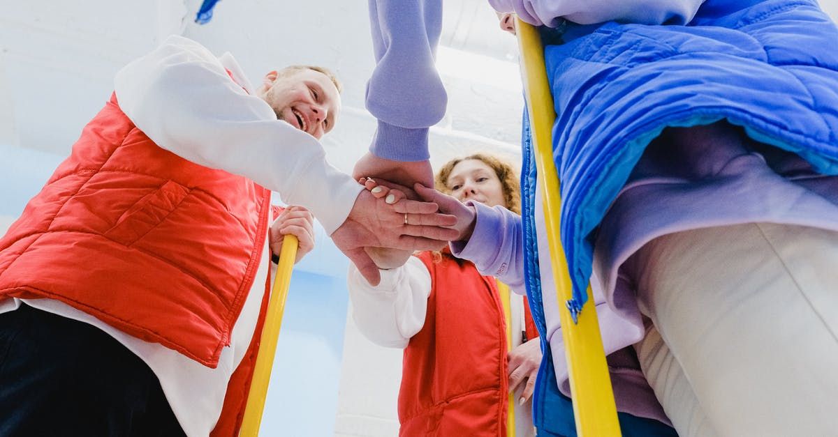 How to detect a player close to a specific block Minecraft 1.9 - From below of satisfied curling players spreading hands and joining palms together during game