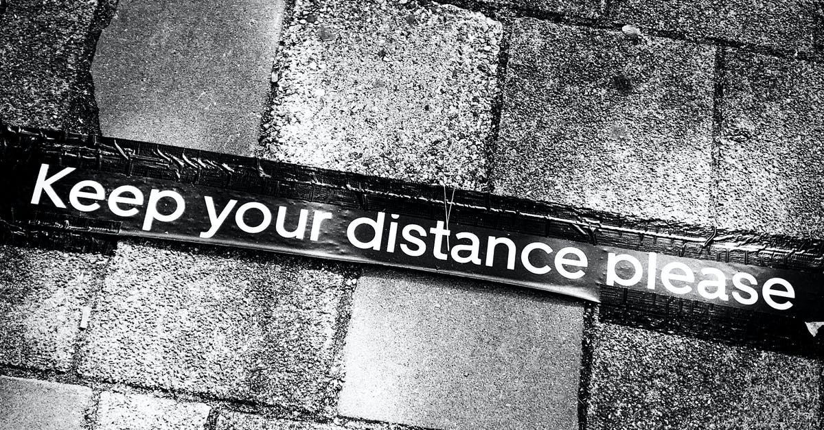How to detect if a command block is outputting a redstone comparator signal? - Inscription on concrete floor in street