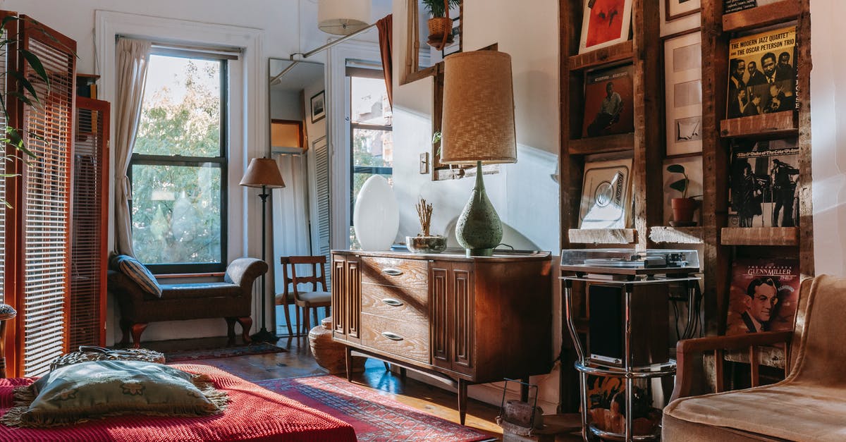 How to detect if a player has a Lime Carpet named "$5" - Interior of cozy studio with bed and couch decorated with vintage furniture and vinyl records
