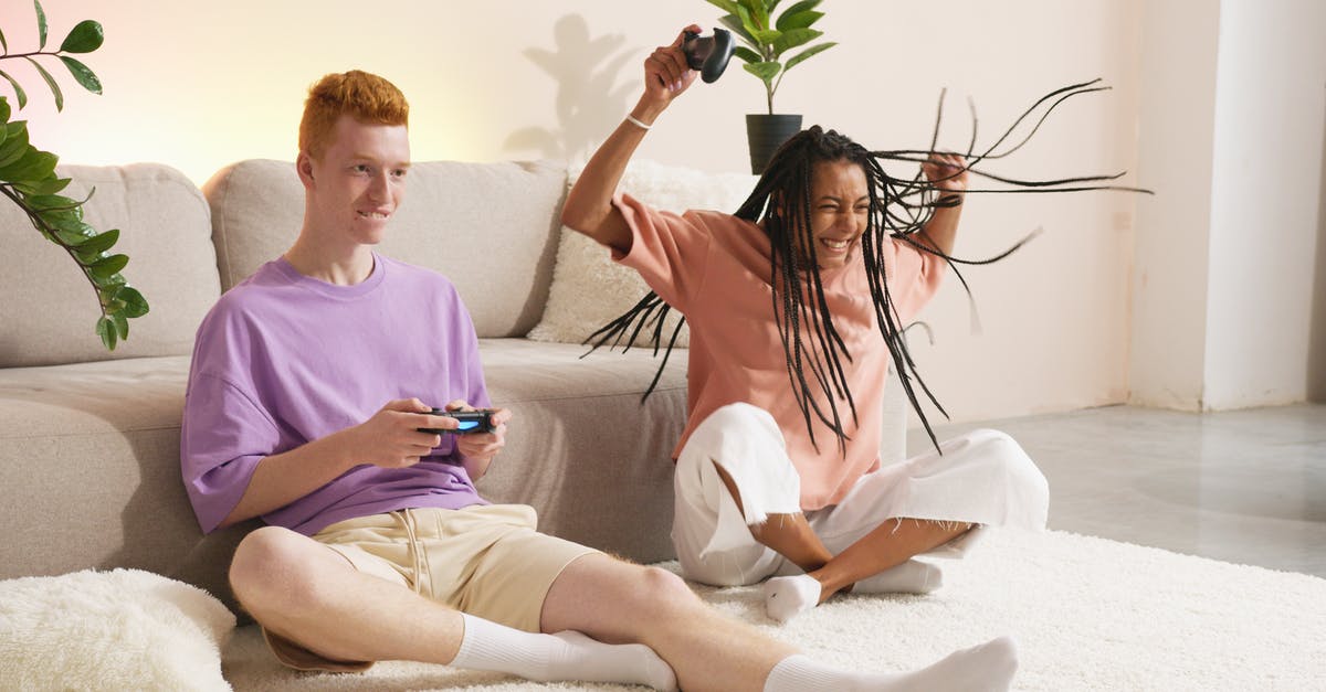 How to detect the winner - A Woman Sitting Beside a Man Playing Video Games