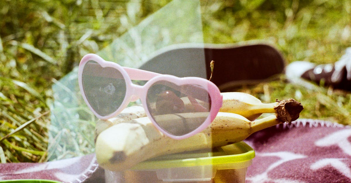 How to disable lens flare in The Evil Within? - From above of modern sunglasses with ripe bananas on plastic container with food on textile on grass meadow How to disable lens flare in The Evil Within? - From above of modern sunglasses with ripe bananas on plastic container with food on textile on grass meadow