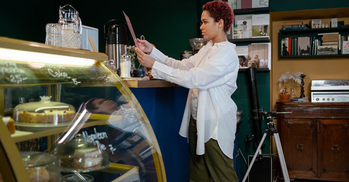 How to disable menu sounds in The Witcher? - A Woman Holding a Menu in a Café How to disable menu sounds in The Witcher? - A Woman Holding a Menu in a Café