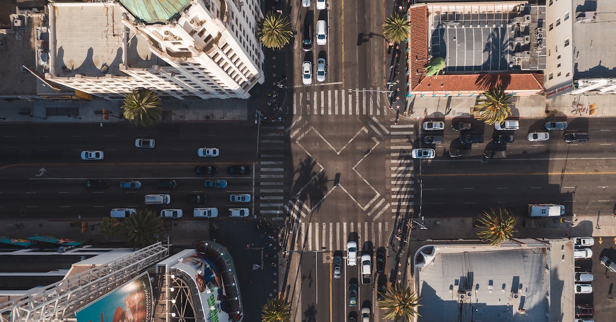 How to dismantle my own city - Cars on Road Near Buildings