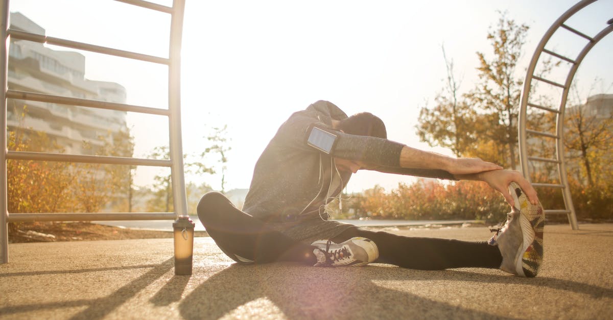 How to drain the well with the Song of Storms - Flexible sportsman stretching on sports ground How to drain the well with the Song of Storms - Flexible sportsman stretching on sports ground