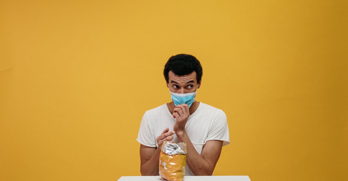 How to eat a virus without being split? - Man in White Crew Neck T-shirt Eating Chips How to eat a virus without being split? - Man in White Crew Neck T-shirt Eating Chips
