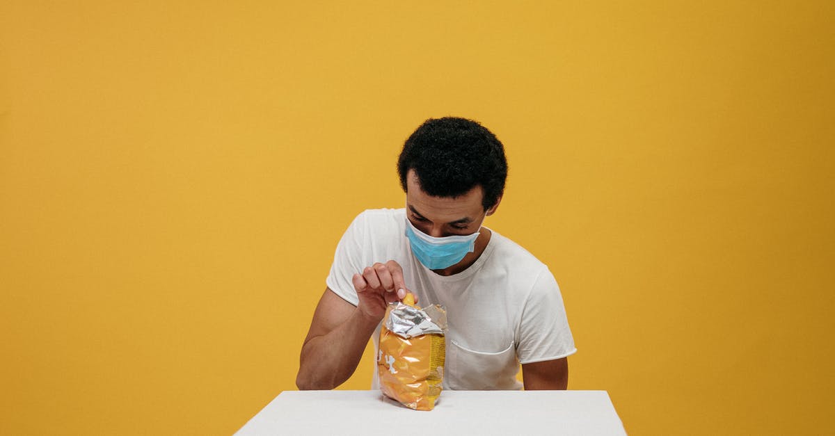 How to eat a virus without being split? - Man in White Crew Neck T-shirt Eating Chips How to eat a virus without being split? - Man in White Crew Neck T-shirt Eating Chips