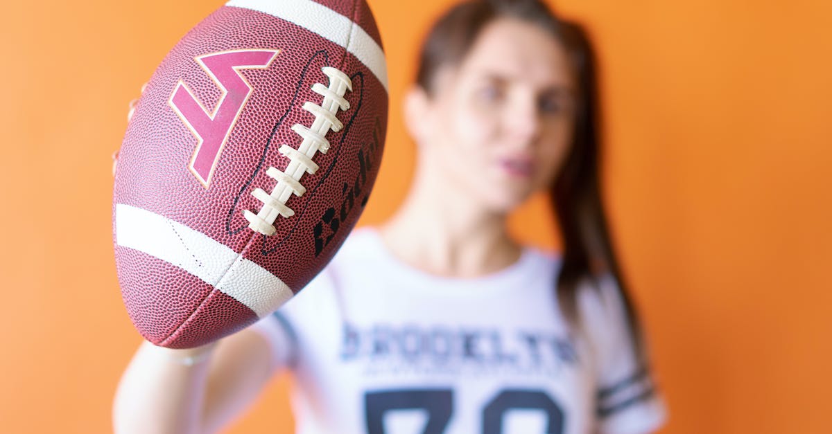 How to edit player info - Woman in White and Red Crew Neck Shirt Holding Brown and Black Basketball How to edit player info - Woman in White and Red Crew Neck Shirt Holding Brown and Black Basketball