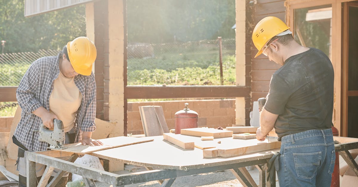 How to efficiently tell workers to return minerals before going to build something in Starcraft 2? -  Man and Woman in Yellow Hard Hats Working Using Industrial Tools