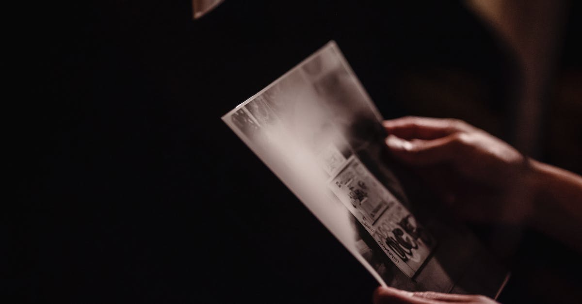 How to enter photo mode? - Person Holding a White Paper How to enter photo mode? - Person Holding a White Paper