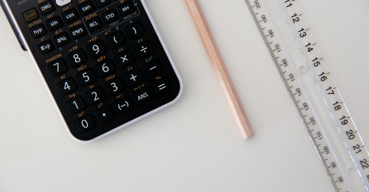 How to equip artifacts? - Black and Gray Calculator Beside Brown Wooden Pencil