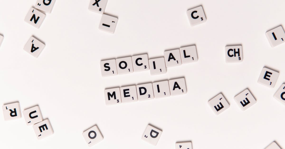 How to execute a command when an entity is a certain number of blocks away from another entity - Black and White Scrabble Blocks